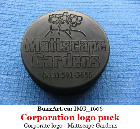 Company Mattscape logo engraved on hockey puck